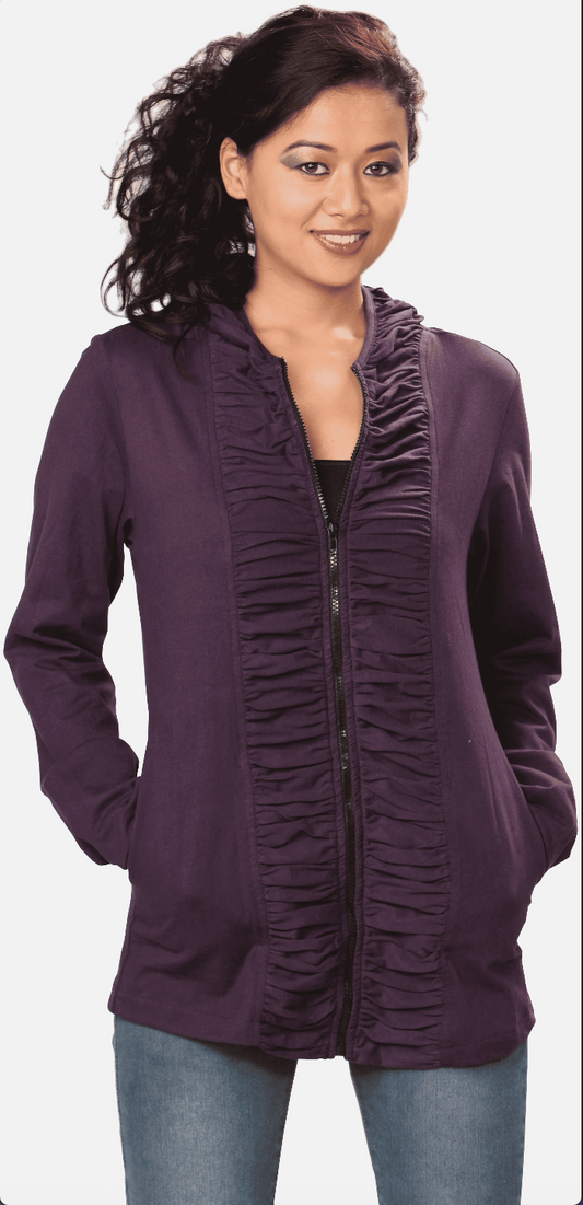 Woman wearing a purple ruched jacket on a white background